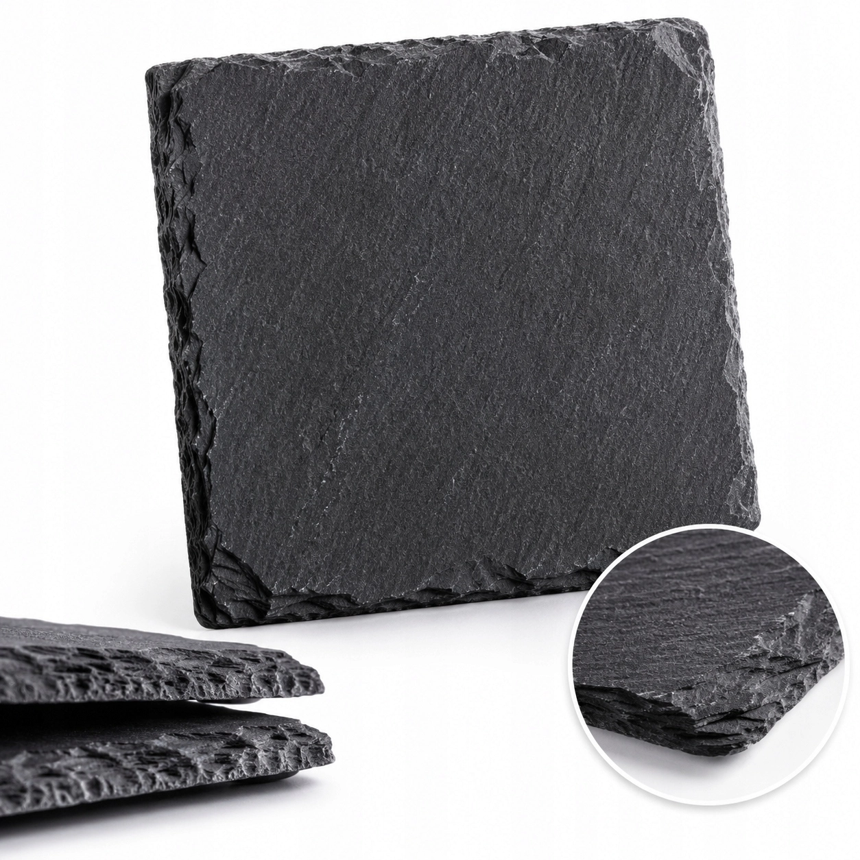 Struktura naturalnego łupka – zbliżenie Close-up of the surface and irregular edges of a slate washer